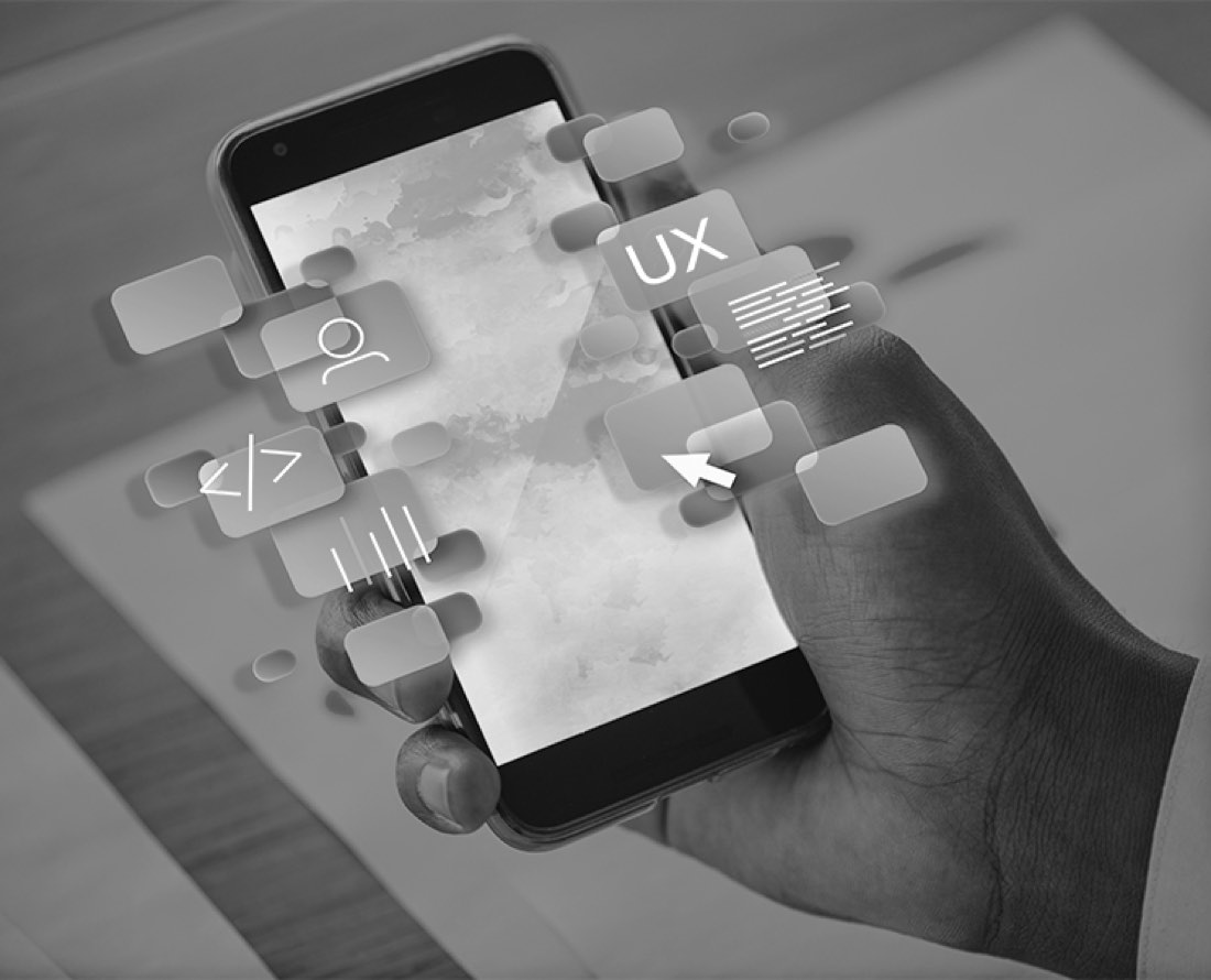 Hand holding a smartphone with floating UX icons